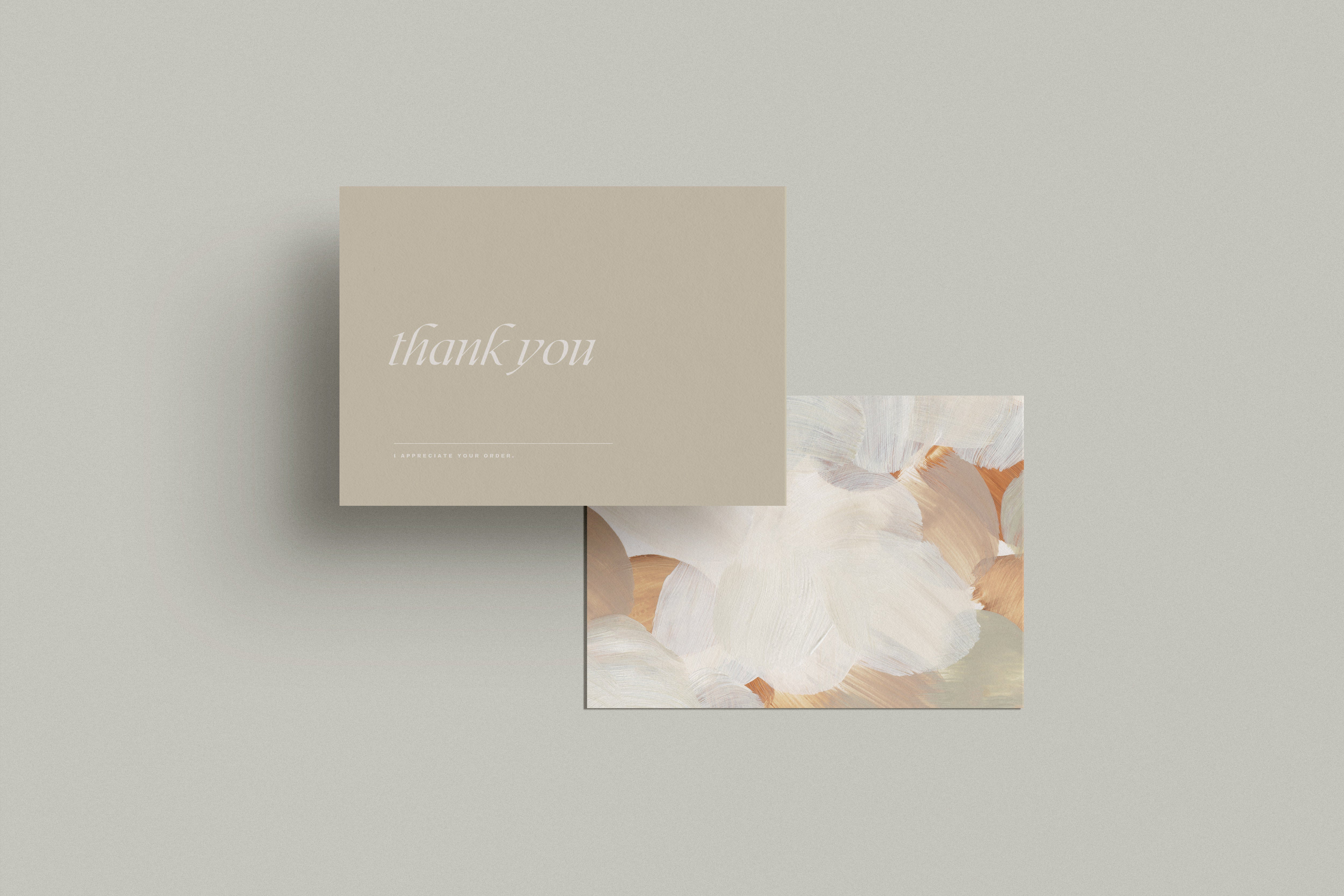 elegant business card design for an artistic brand