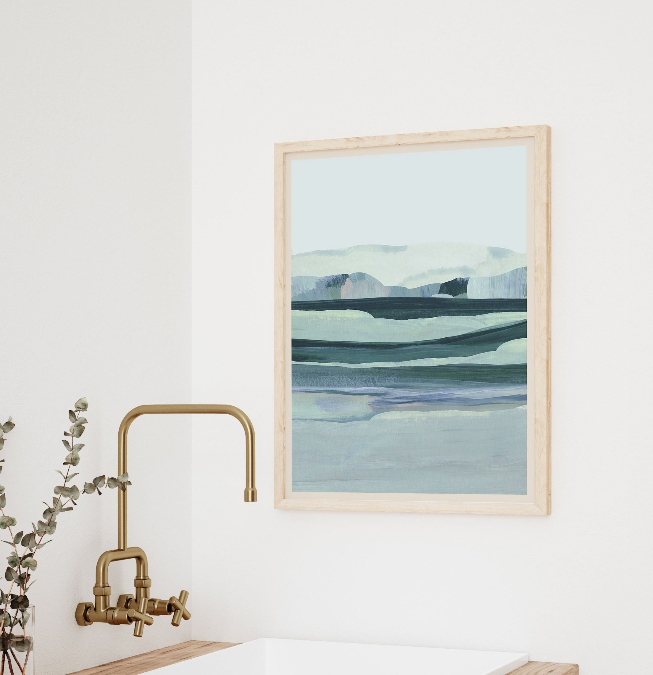 blue vertical landscape hanging on a wall