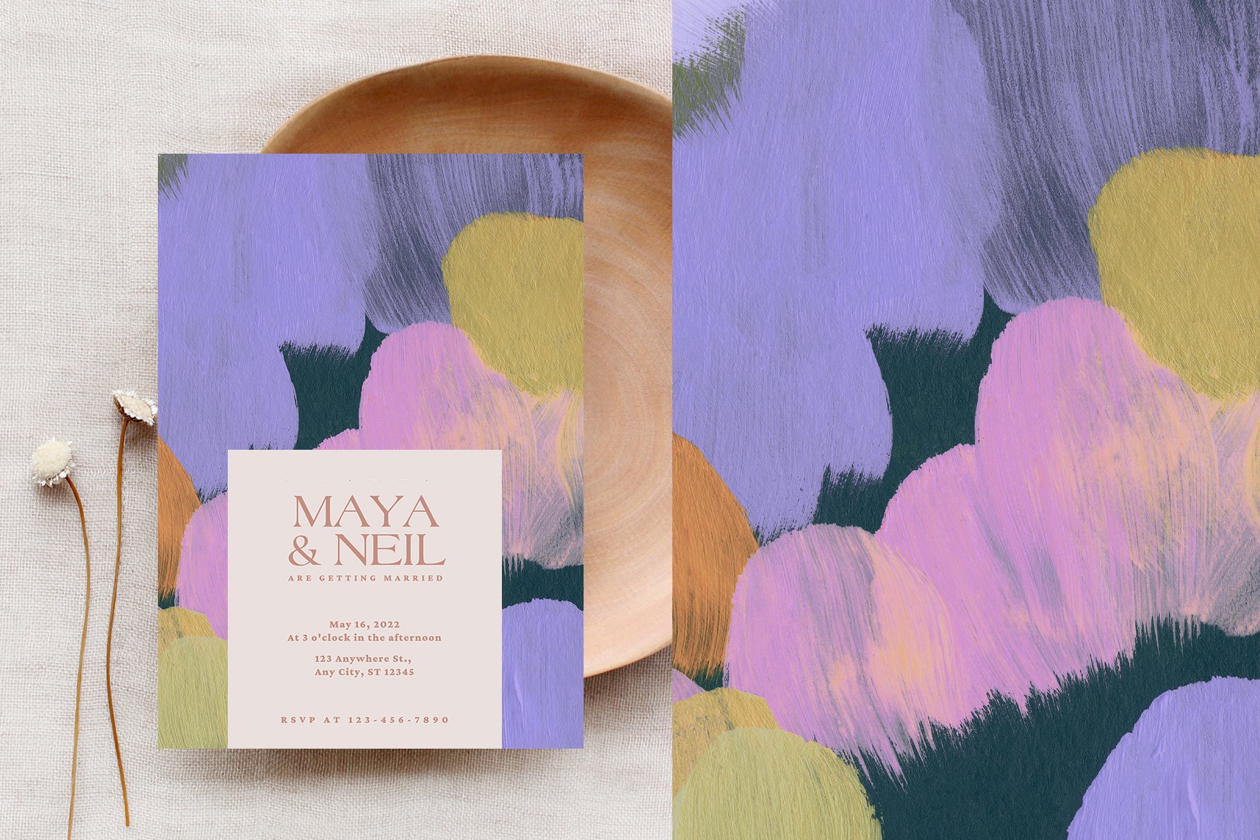 painted artistic background on top of wedding invitation design