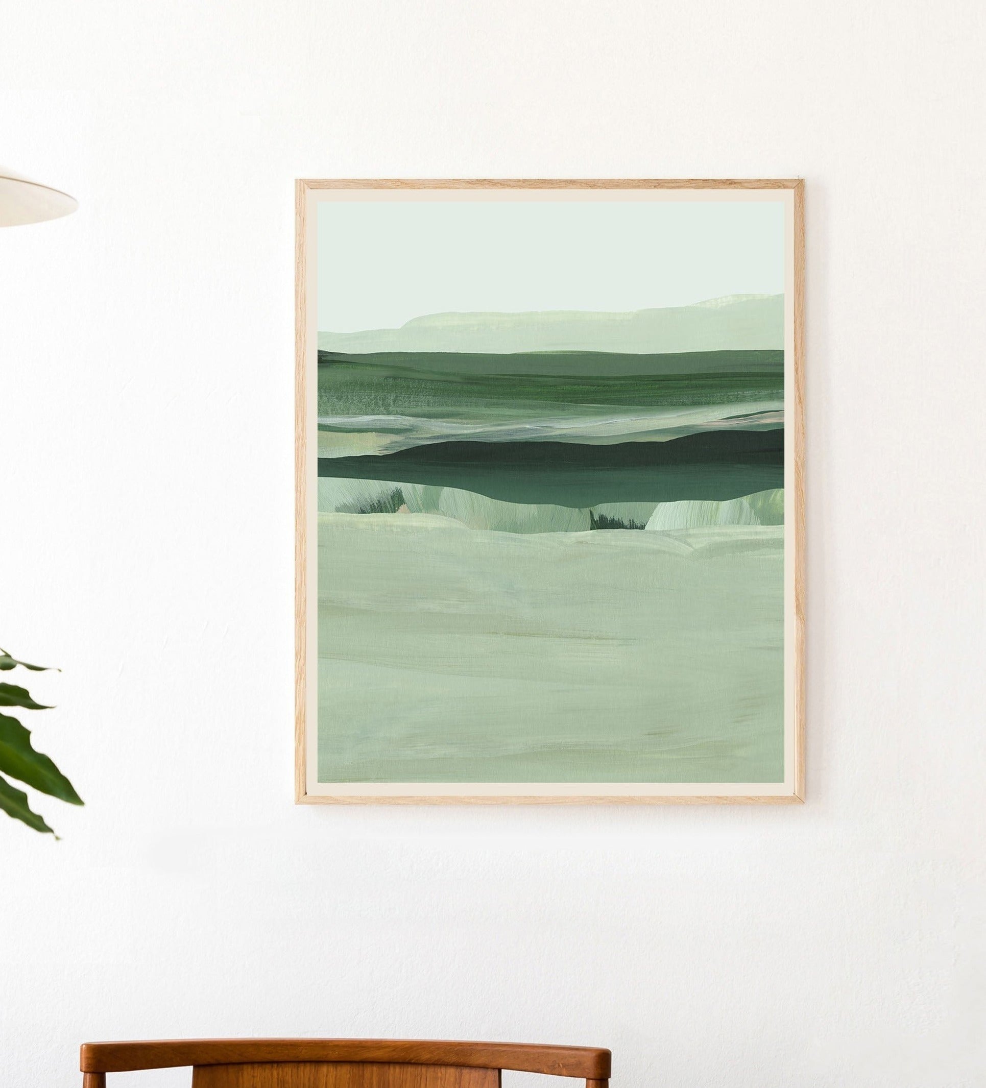 green landscape art print of rolling hills